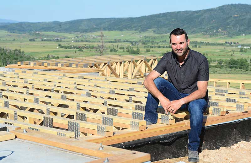 photo of man at construction scene